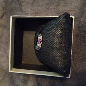 White, Blue & Purple diamond heart shaped ring.There are 7 Hearts. Size 6.
